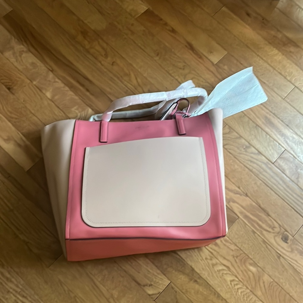New with tags, Kate spade, pink tote. Style lalena large pocket tote. Rosetntmlt